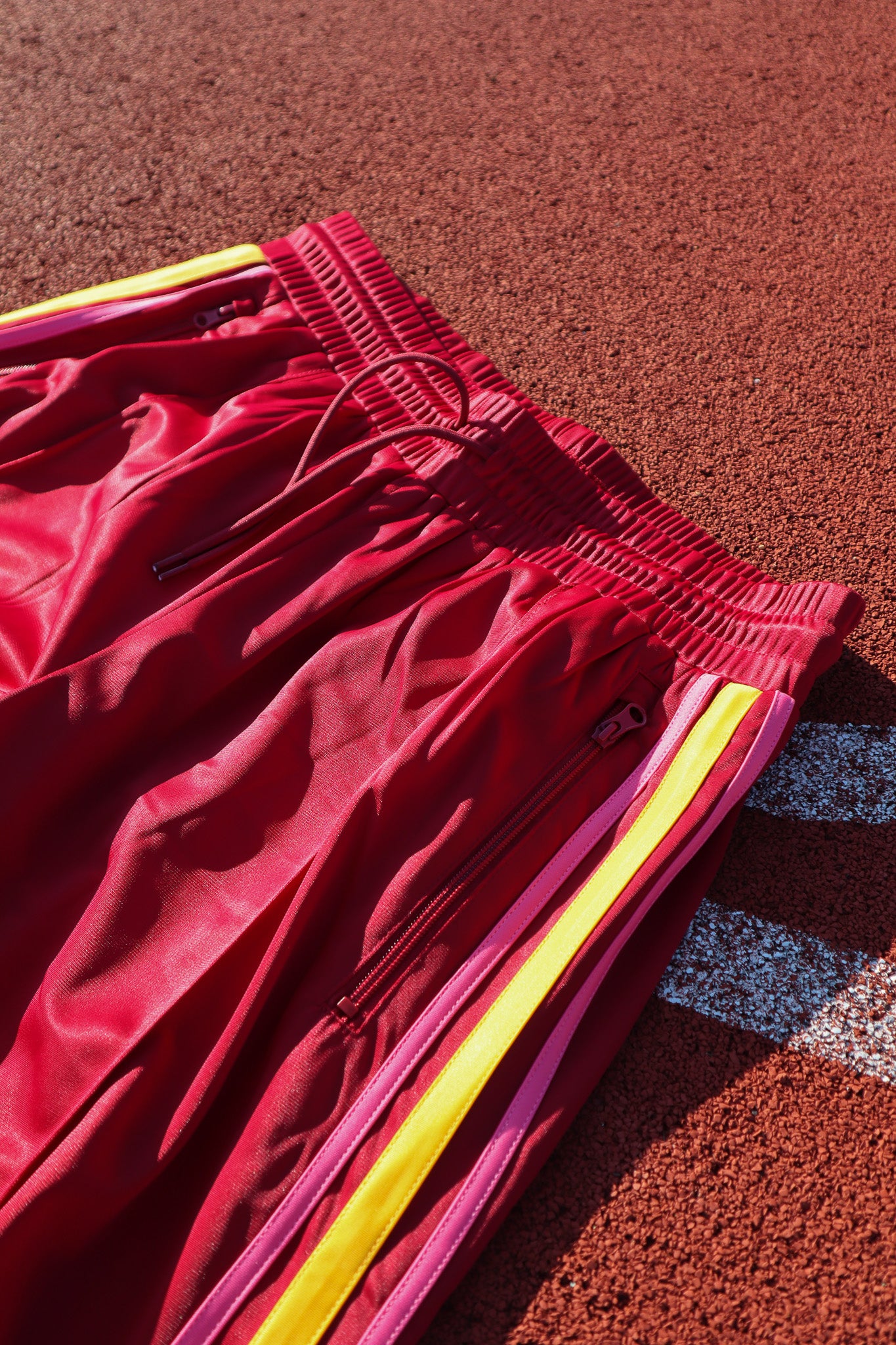 track pants - red